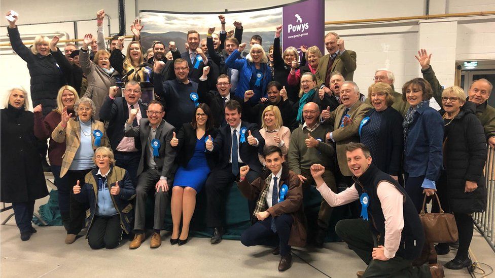 All smiles as the Tories celebrate taking back Brecon and Radnorshire from the Lib Dems, just four months after they lost it in a by-election
