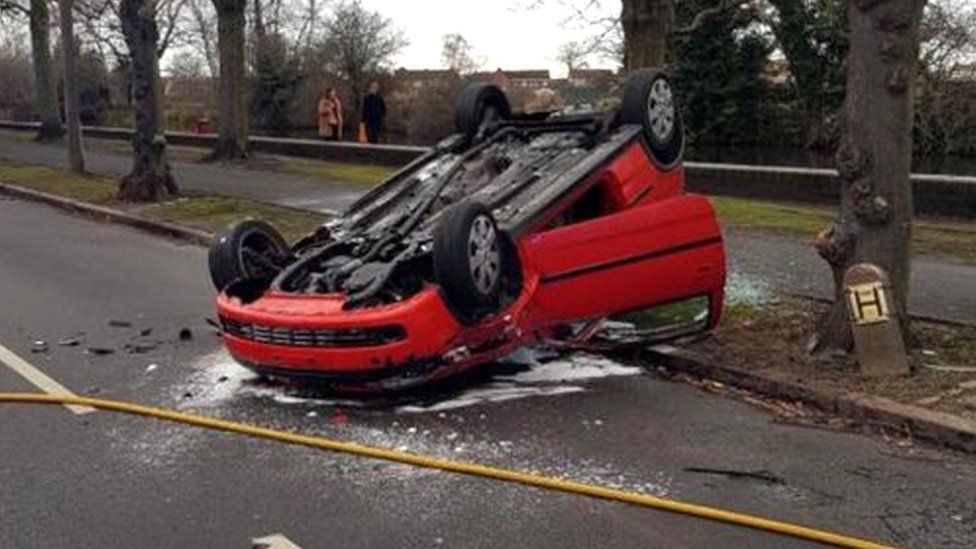 Man jailed over woman and left in flipped car - BBC News