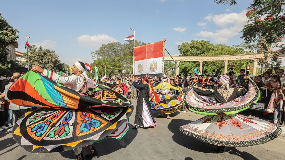 People watch whirling dancers in Ismailia, Egypt - Monday 13 May 2024