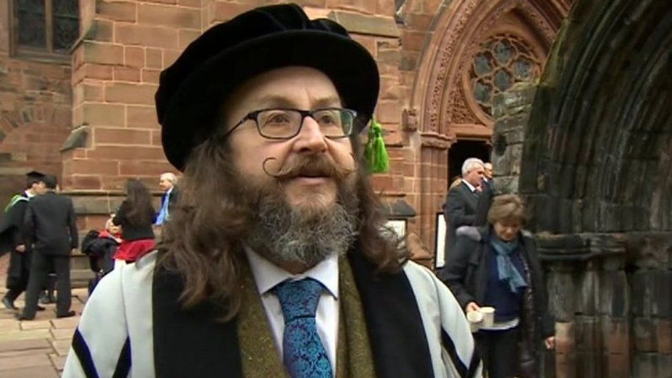 Dave Myers, wearing his cap and gown, at Cumbria Cathedral