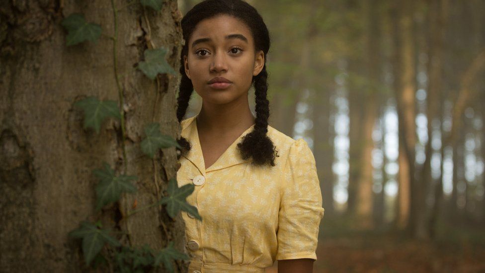 Young woman wearing a yellow dress