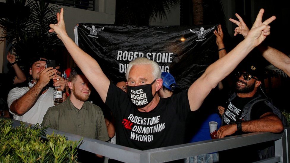 Roger Stone reacts to the news of the commutation of his sentence, outside his home in Fort Lauderdale