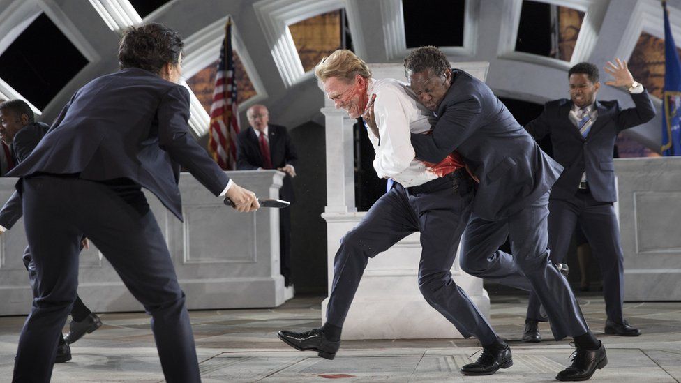 This production of Julius Caesar with Gregg Henry (centre) as Caesar at the Delacorte Theatre in New York in 2017 depicted the assassination of a Trump-like Roman rule