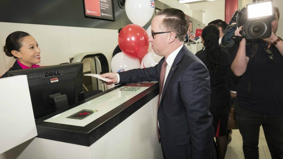 Qantas Chief Executive Alan Joyce at the check-in counter at Perth Airport for the first direct flight to Heathrow airport. 24 March 2018.