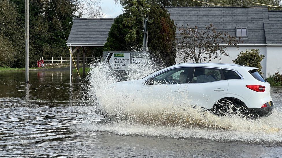 A car driving through flood water