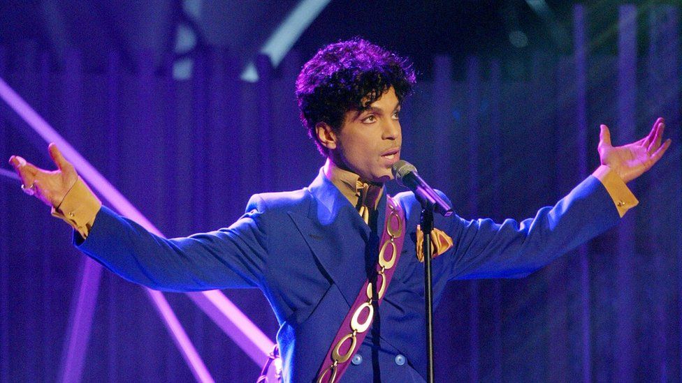 Grammy and Oscar-winning recording artist Prince performs the song "Purple Rain" at the 46th Annual Grammy Awards held at the Staples Center on February 8, 2004