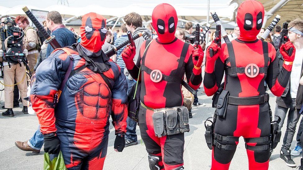 Deadpool fans in costume