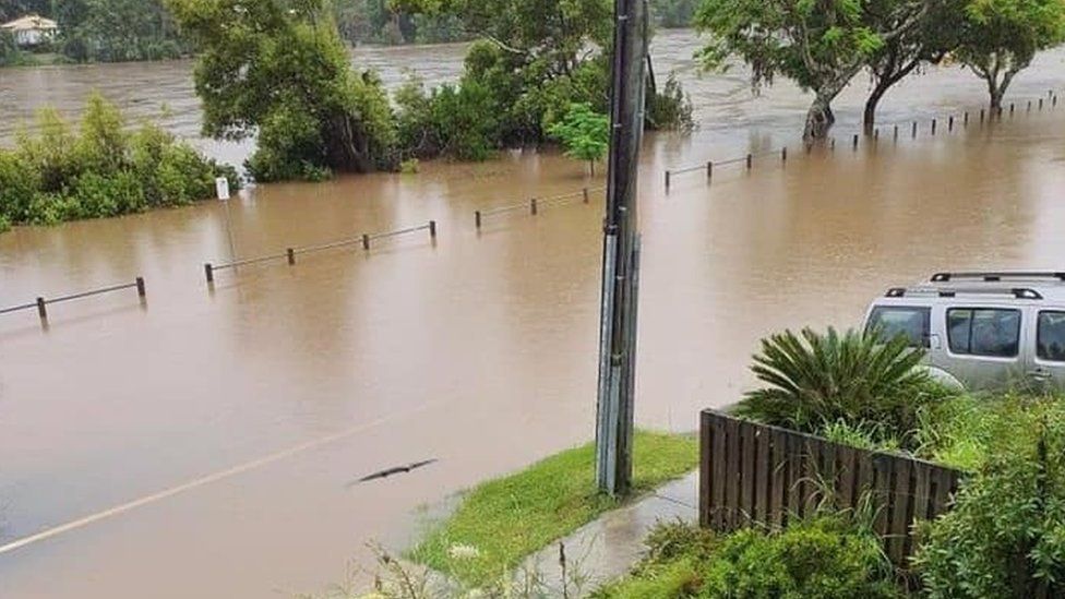 Floodwaters rising next to residential homes in the New South Wales town of Tumbulgum on 15 December 2020