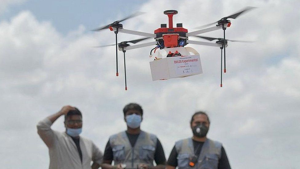 Technicians fly a drone belonging to the Throttle Aerospace Systems (TAS) to deliver life saving medical supplies during a flight testing