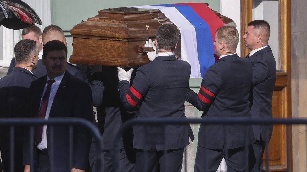 Employees transfer the coffin with the remains of the late former Soviet president Mikhail Gorbachev for a farewell ceremony to the Hall of Columns of the House of Trade Unions in Moscow, Russia, 03 September 2022.