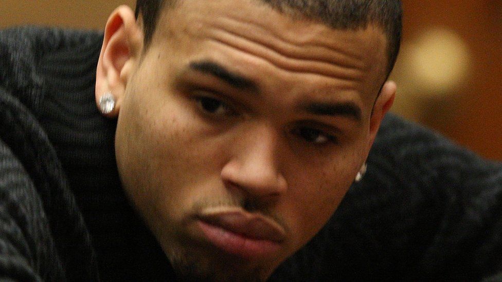 R&B singer Chris Brown appears in court for a probation progress report hearing on January 28, 2011 in Los Angeles