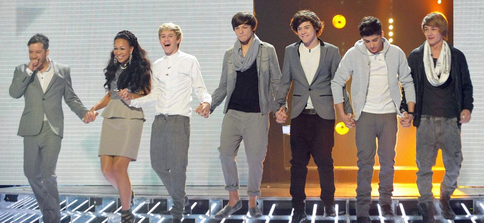 Left-right: Matt Cardle, Rebecca Ferguson and One Direction on The X Factor in 2010