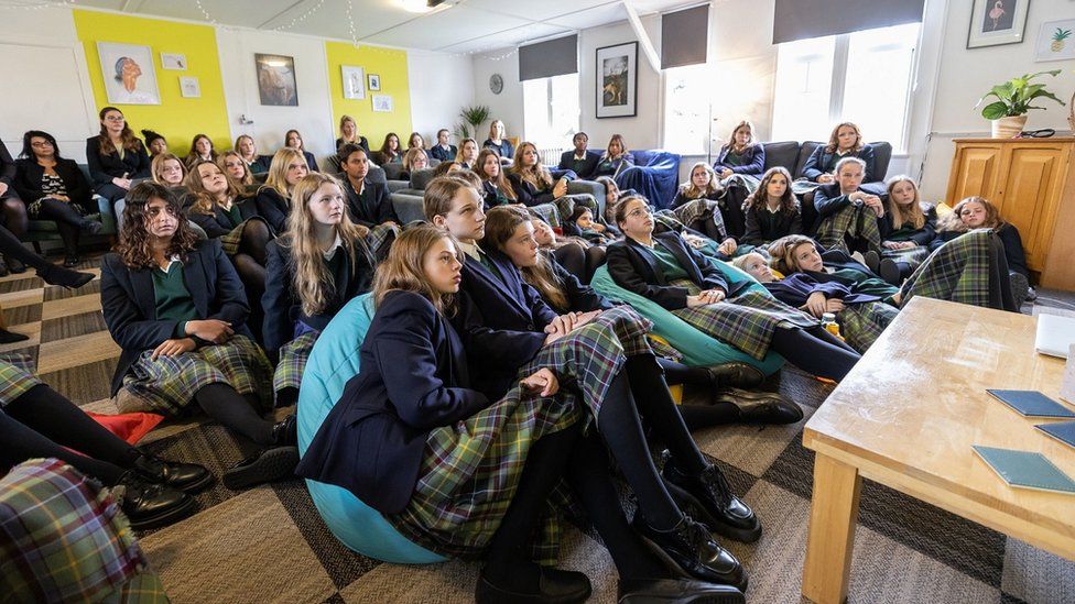 Students watch the state funeral of Queen Elizabeth II in their boarding house, Windmill Lodge, at Gordonstoun School, Moray, where King Charles III once boarded
