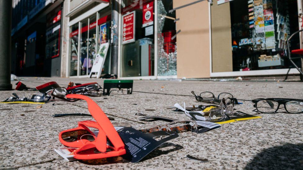 Products strew on the pavement after looting in Stuttgart, 21 June 2020