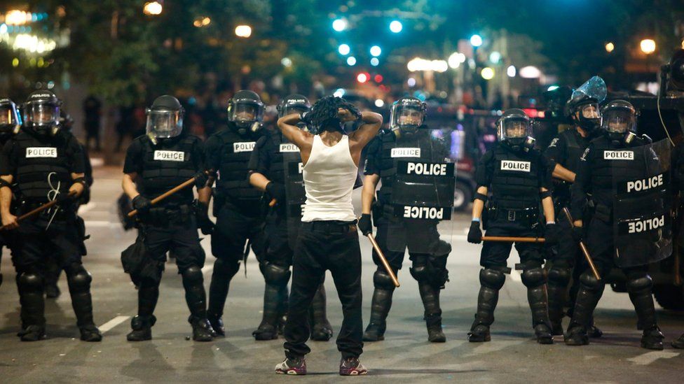 Police clash with protestors during demonstration in Charlotte, North Carolina, on 21 September