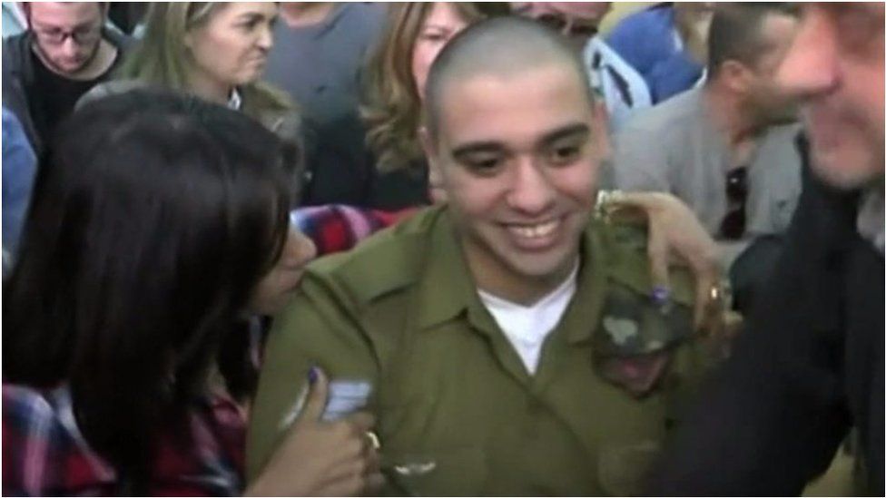 Elor Azaria in court with his mother