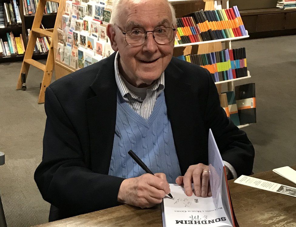 Paul Salsini signing his book
