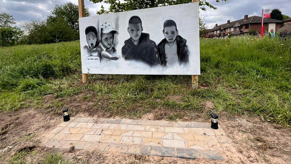 A graffiti tribute to four boys who fell into an icy lake in December has been created by the community.