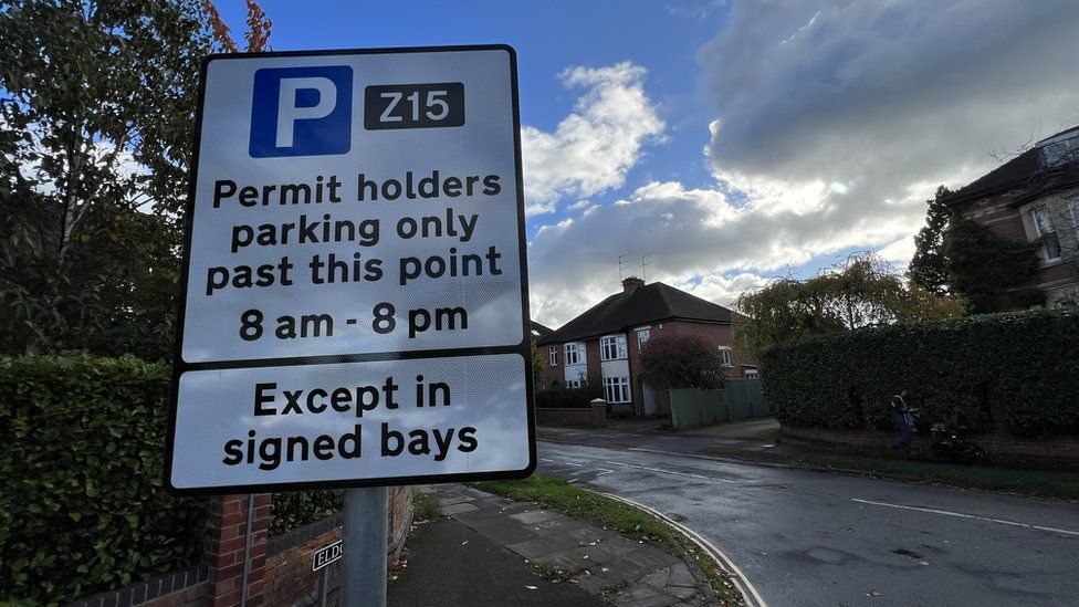 A permit holders parking sign in a street