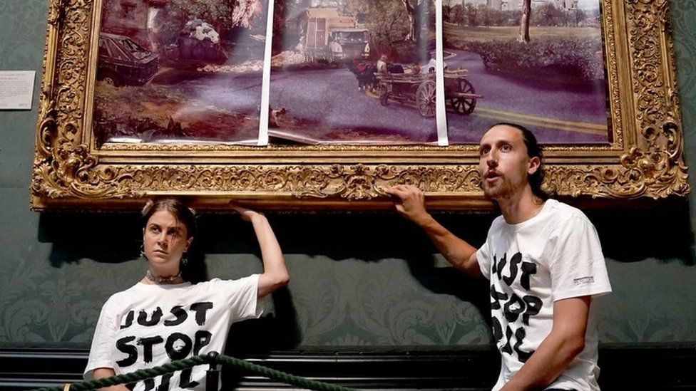 File photo of Just Stop Oil protesters Hannah Hunt and Eben Lazarus sitting underneath the Constable painting during their protest