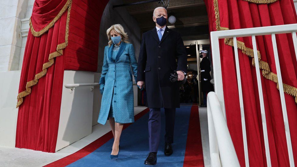 US President Joe Biden and US First Lady Jill Biden arrive for his inauguration as the 46th US President
