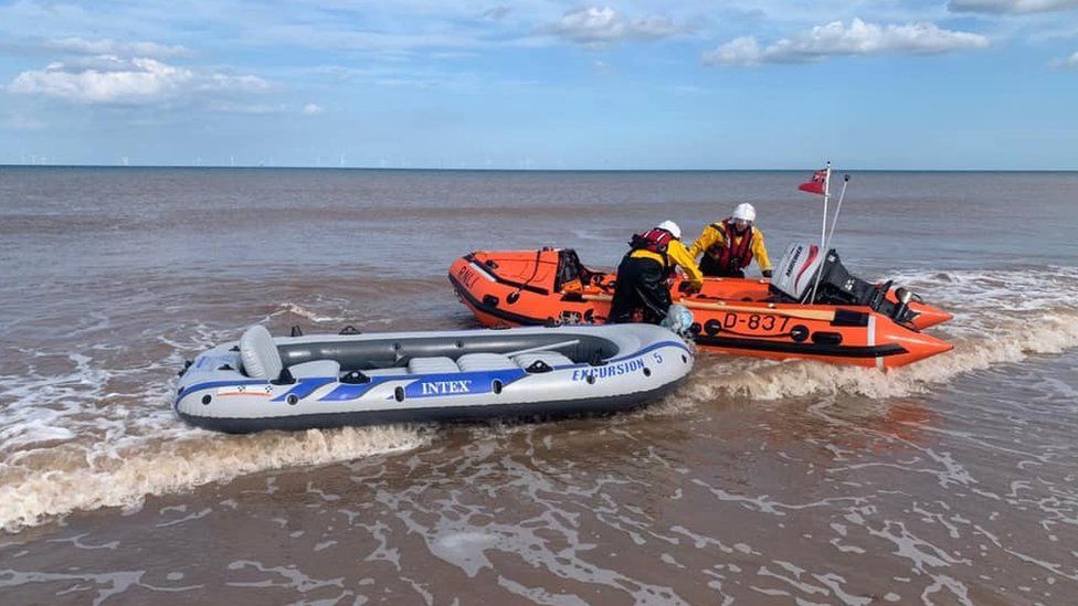 Dinghy being brought to shore