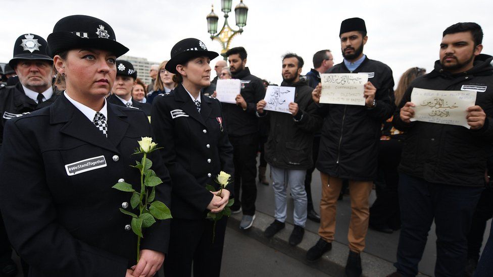 Police joined the vigil