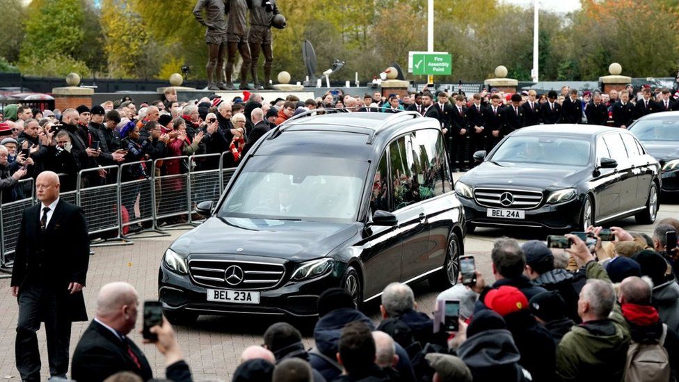 The funeral procession for Sir Bobby Charlton passes Old Trafford