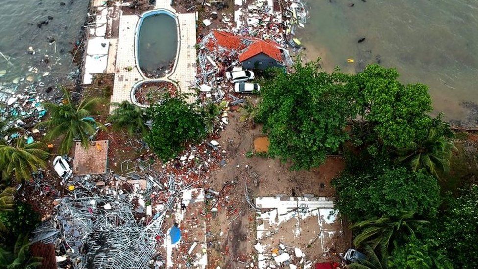 An aerial photo showing damaged buildings in Carita