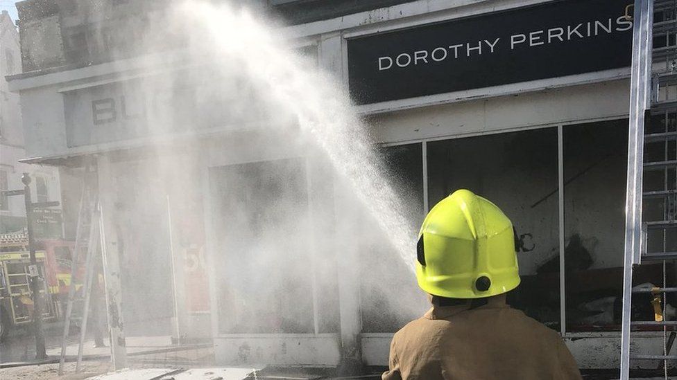Firefighters at Dorothy Perkins in Dumfries
