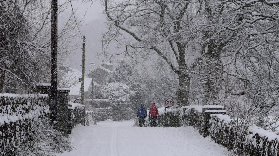 Snow covers the ground in Grasmere, Cumbria
