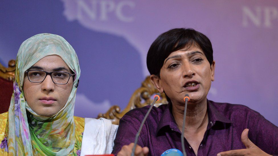 Transgender election candidates Nayyab Ali (L) and Nadeem Kashish speak at a news conference in Islamabad, 5 July 2018