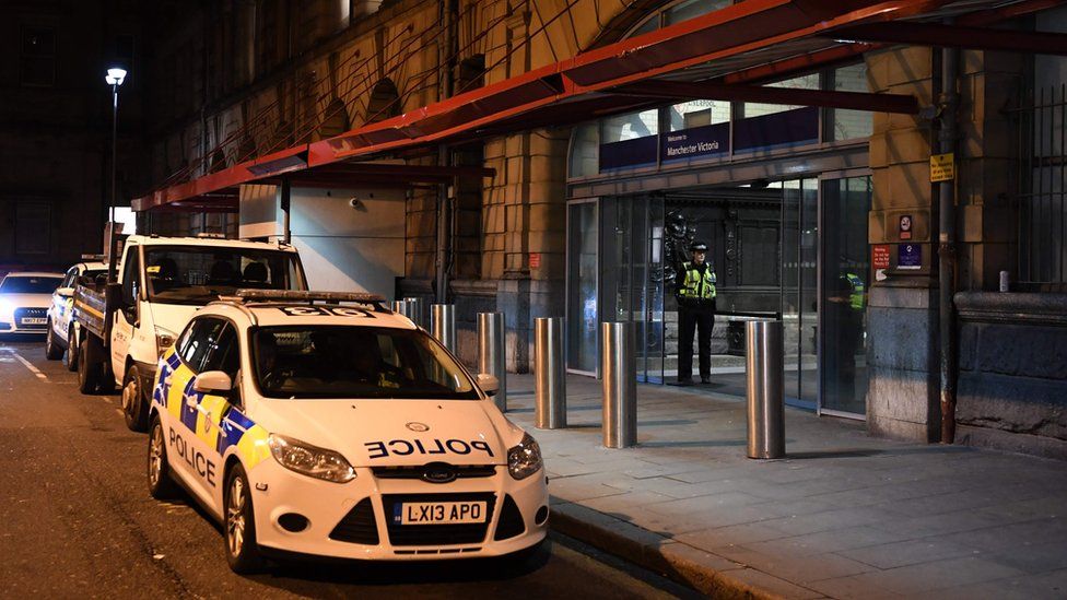 Police cars outside Manchester Victoria