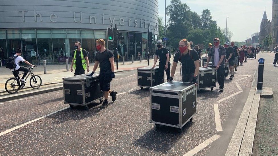 Music crew take part in a dy of action in Manchester in August 2020