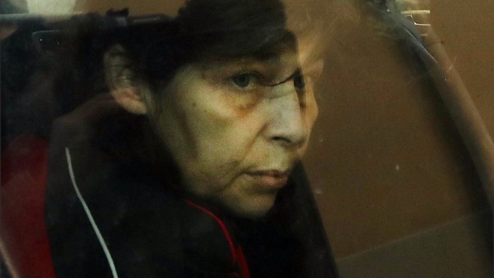 Patricia Dagorn, a woman suspected of being a serial poisoner trapping wealthy widowers from the Cote d'Azur, is seen in a car as she arrives at court in Nice, south-eastern France, on 15 January 2018 to attend her trial