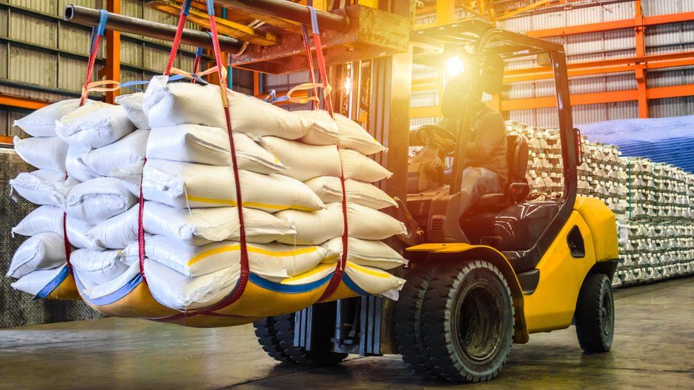 Forklift truck with bags of sugar