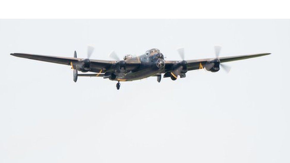 Lancaster bomber PA474 takes off from her home base of RAF Coningsby in Lincolnshire