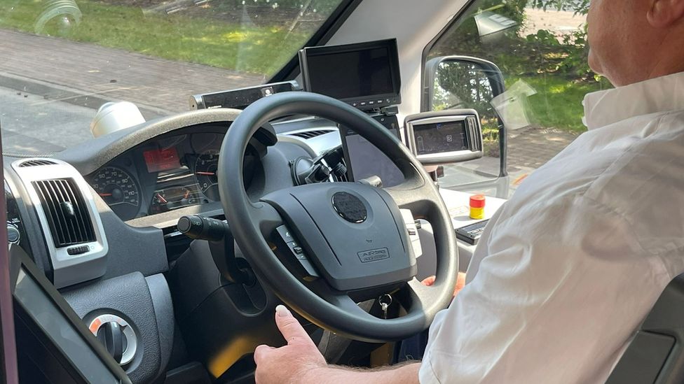 Driver with hands off steering wheel (June 2023)