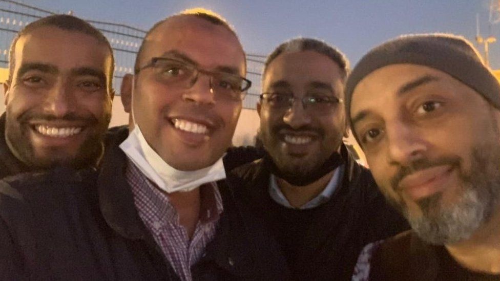 outside the prison after his release with cousins Ziyad and Ahmed and brother Ahmed