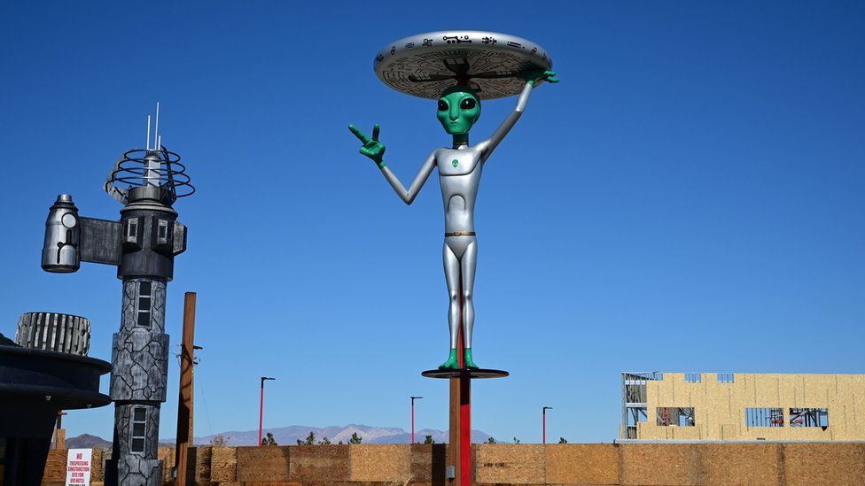 An-alien-sculpture-lines-the-side-of-the-road-in-the-town-of-Baker-California.