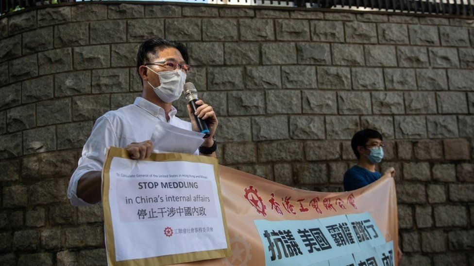 Pro-China activists protest against US sanctions imposed on Hong Kong government officials