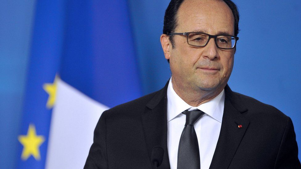 French President Francois Hollande holds a press conference at the end of talks over the Greek debt crisis in Brussels on July 13, 2015.