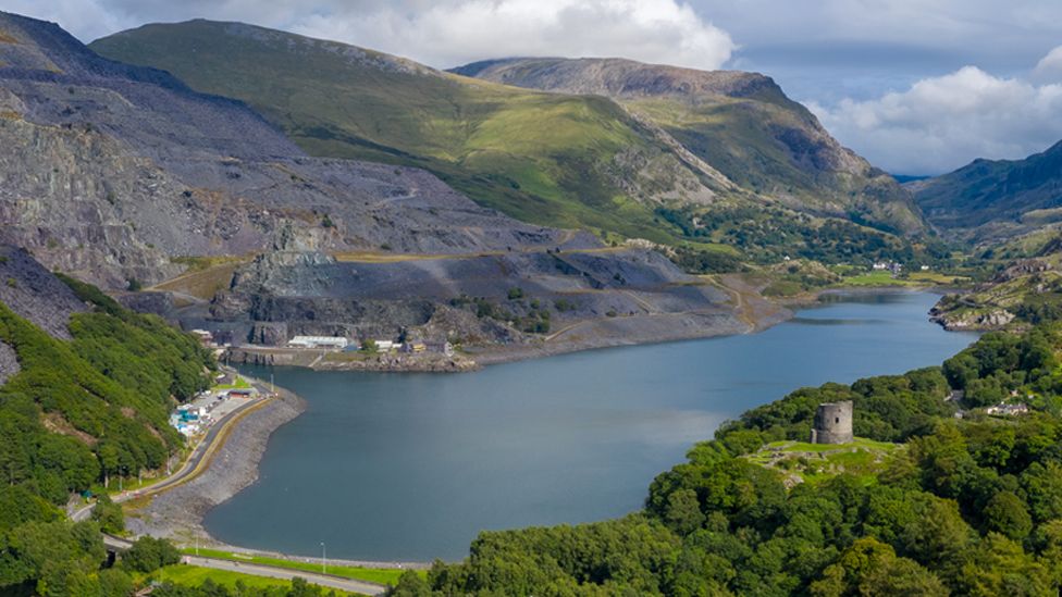 Aerial view of Dinorwic Quarry, near Llanberis, Gwynedd, Wales - with Llyn Peris, Llyn Padarn, the Dinorwig Power Station Facilities and Mount Snowdon in the background