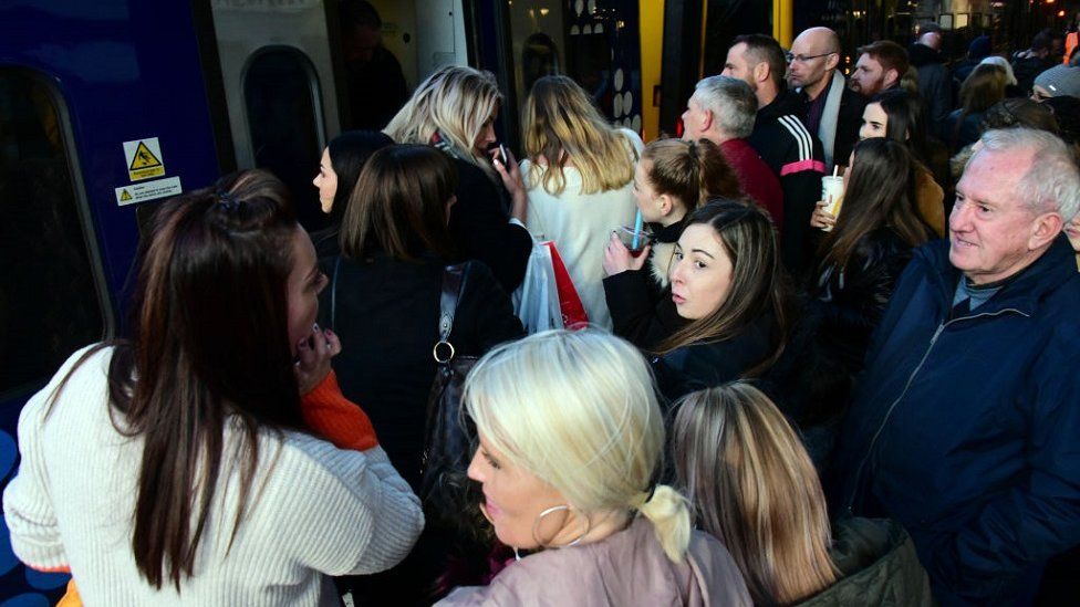 Crowds try to get on train at Edinburgh Waverley