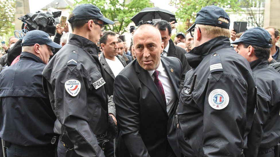 Kosovo's former Prime Minister Ramush Haradinaj (C) in Colmar, eastern France