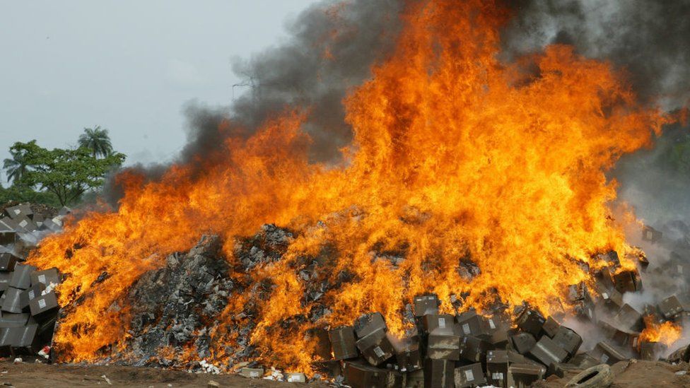 This file picture taken on November 1, 2007 at Shagamu dump site in Ogun State, southwest Nigeria shows seized cartons of fake drugs set ablaze by officials of the National Agency for Food and Drug Administration and Control
