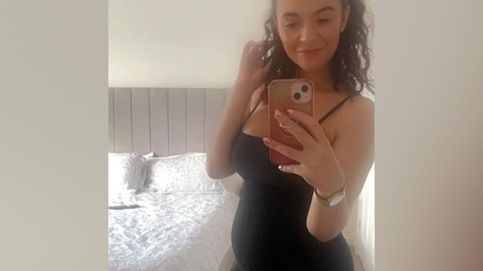 A selfie taken by Charlotte Chilton showing her baby bump
