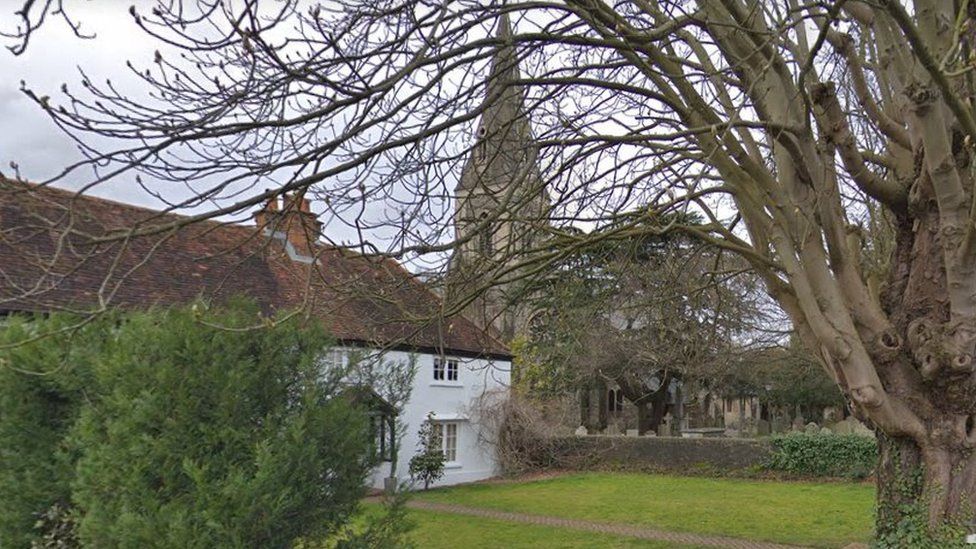 Google StreetView image of St Dunstan's Church in Cheam, seen from a street corner.