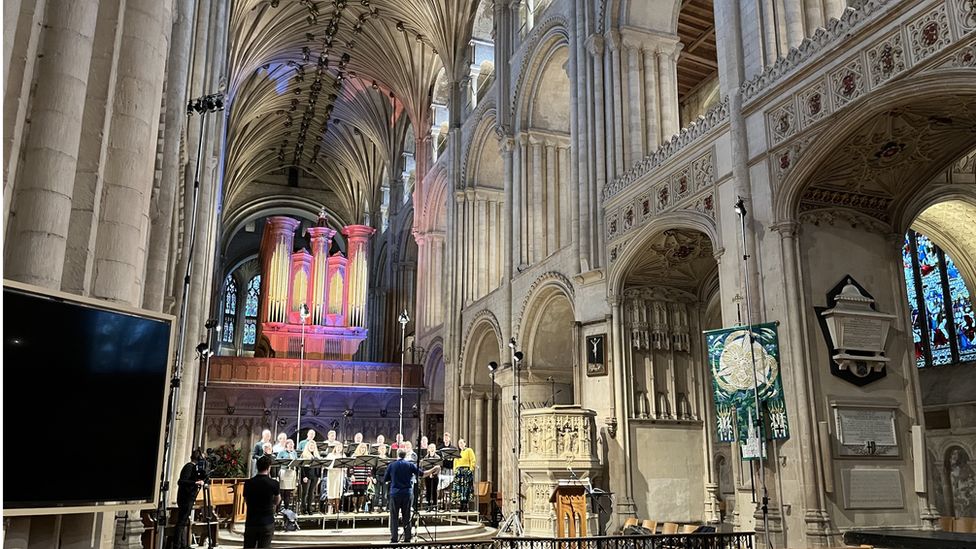 Ed balls conducting at Norwich Cathedral in rehearsals