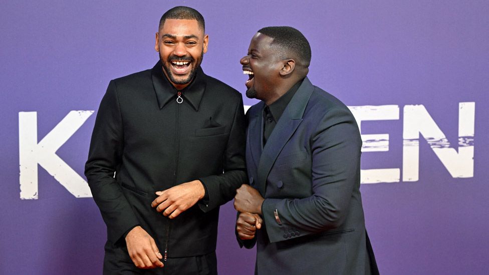 British rapper Kano (L) shares a joke with British co-director Daniel Kaluuya (R) on the red carpet upon arrival to attend the world Premiere of the film "The Kitchen" during the 2023 BFI London Film Festival in London, on October 15, 2023